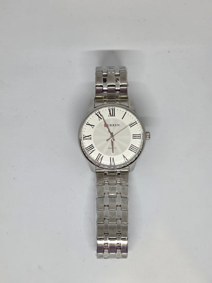 ALTAIR – Reloj Curren con Números Romanos y Pulso Metálico Plateado