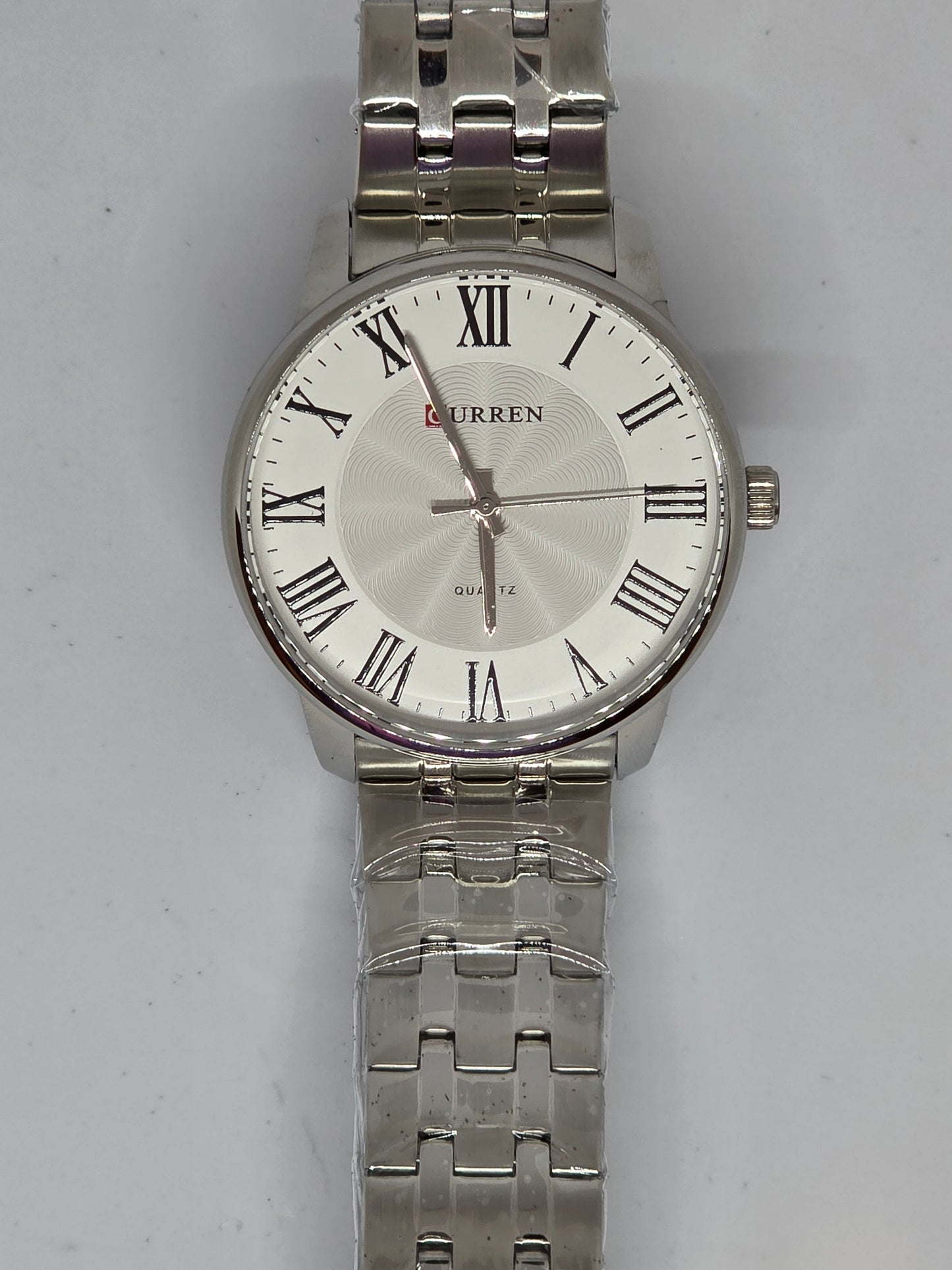 ALTAIR – Reloj Curren con Números Romanos y Pulso Metálico Plateado